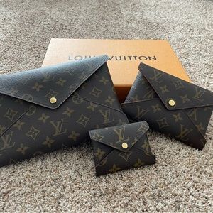Lv Monogram Kirigami large pouch Only